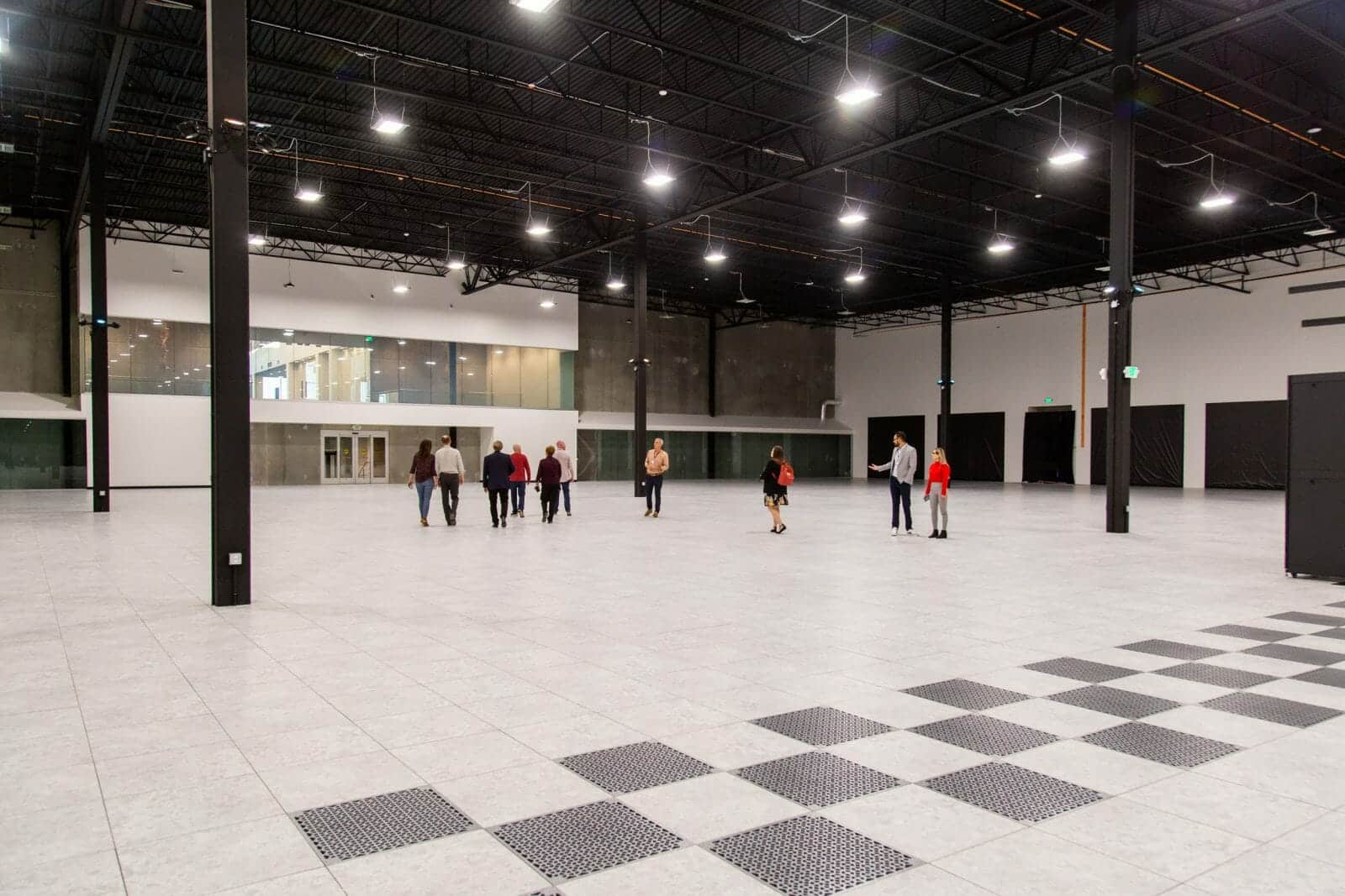 A group of people touring the new data center facility by Novva