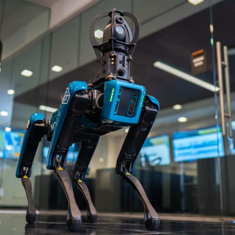 WIRE - Novva Data Centers robotic security dog standing in front of data center security gate in Salt Lake City, Utah