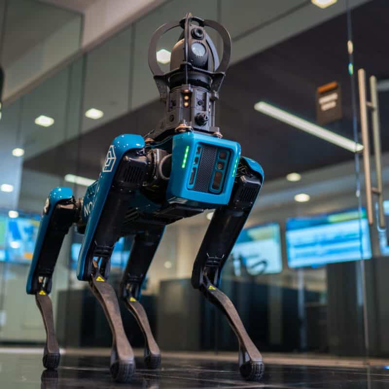 WIRE - Novva Data Centers robotic security dog standing in front of security gate at Utah data center in Salt Lake City