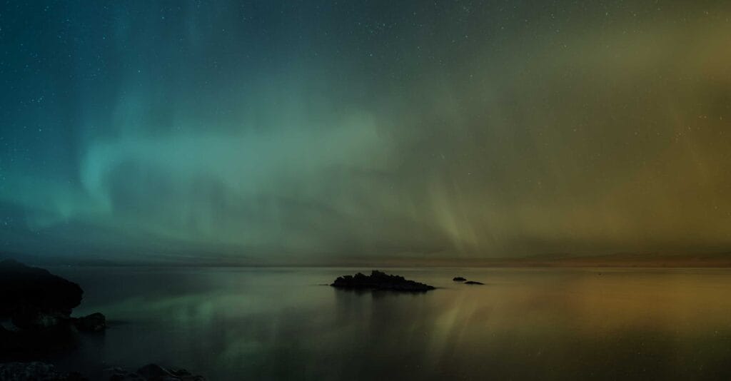 Aurora borealis lights over a lake