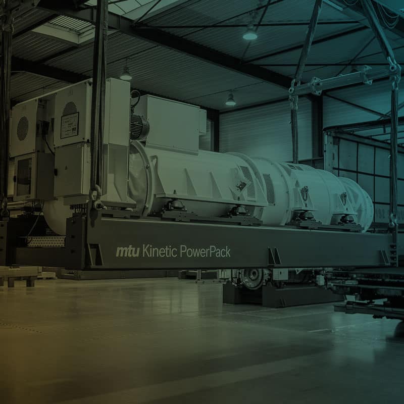 MTU Kinetic PowerPack being loaded into a semi truck